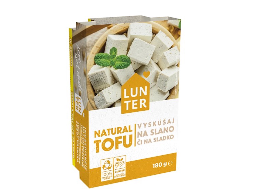 Original packaging of Tou Natural by Lunter. A white-and-orange wrapper featuring an image of sliced tofu in a wooden bowl, garnished with mint leaves.